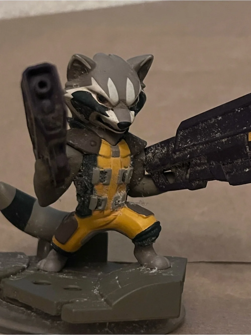 Disney Rocket Raccoon Figure in Yellow and Gray